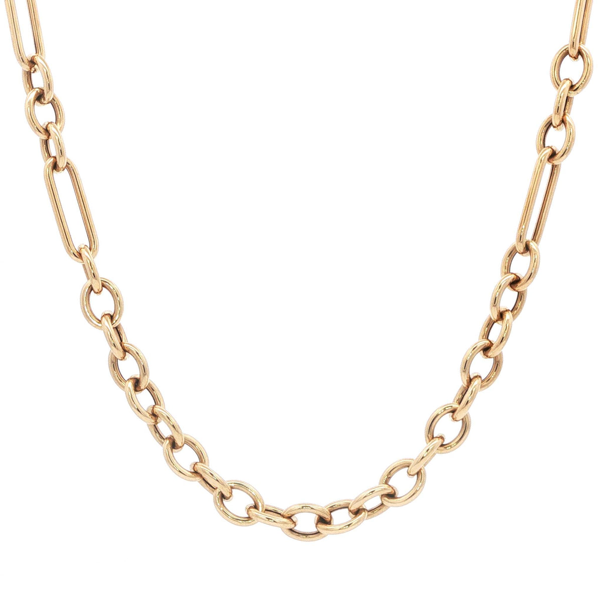 The Curator Chain, a 14k gold mixed link necklace with toggle clasp