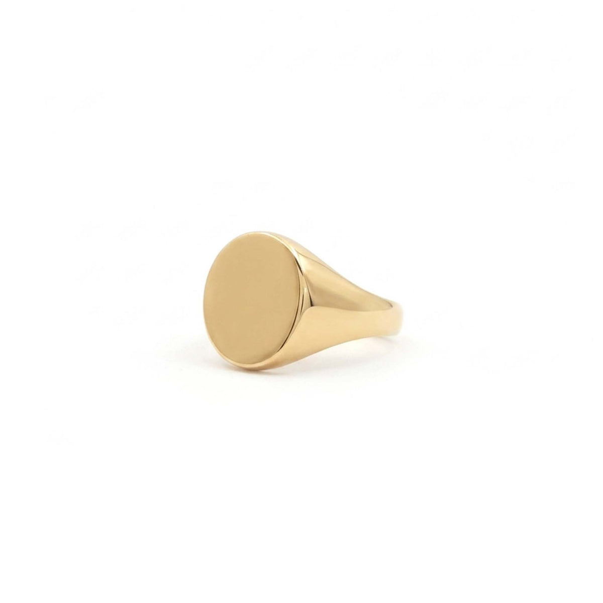 The Petite Signet Ring, a hand engraved gold signet ring